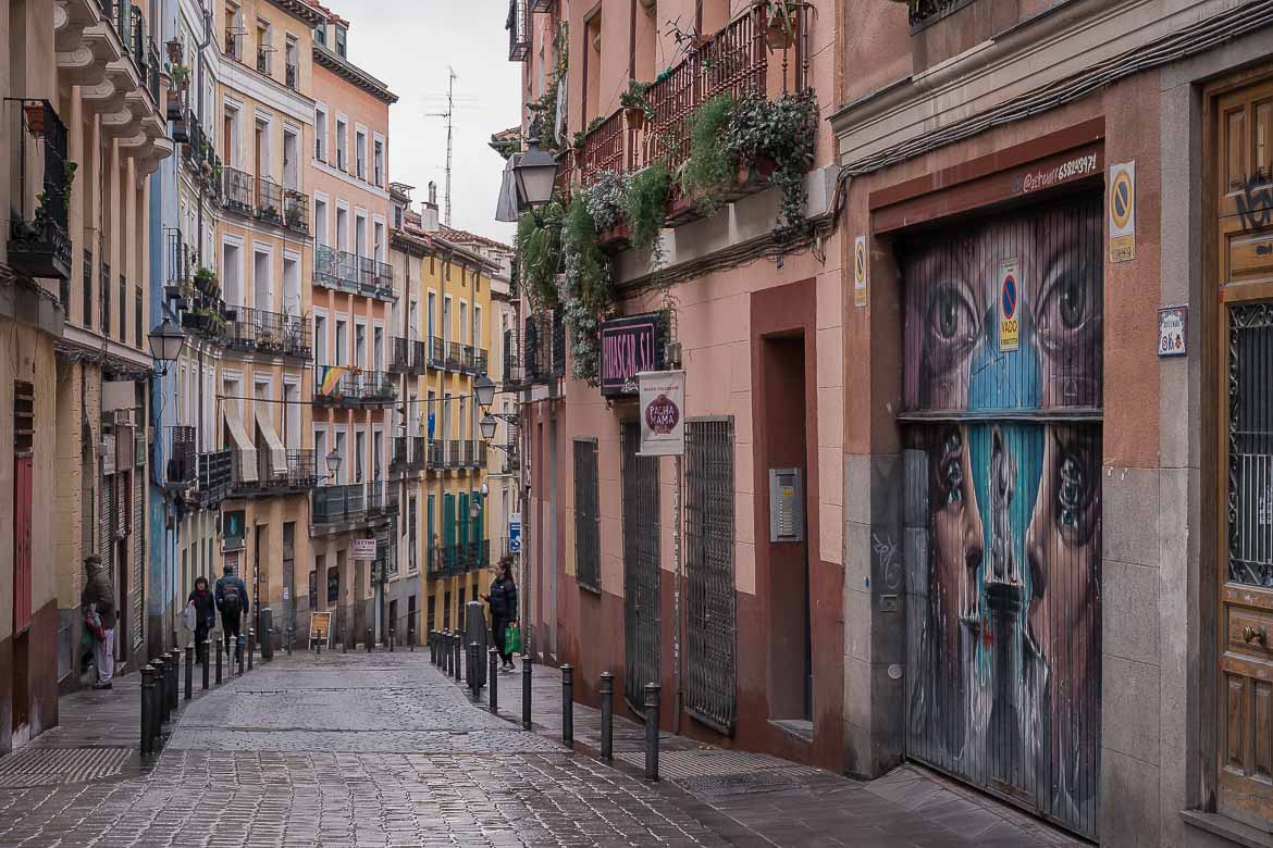 This image shows a steep narrow street in the Lavapies neighbourhood.
