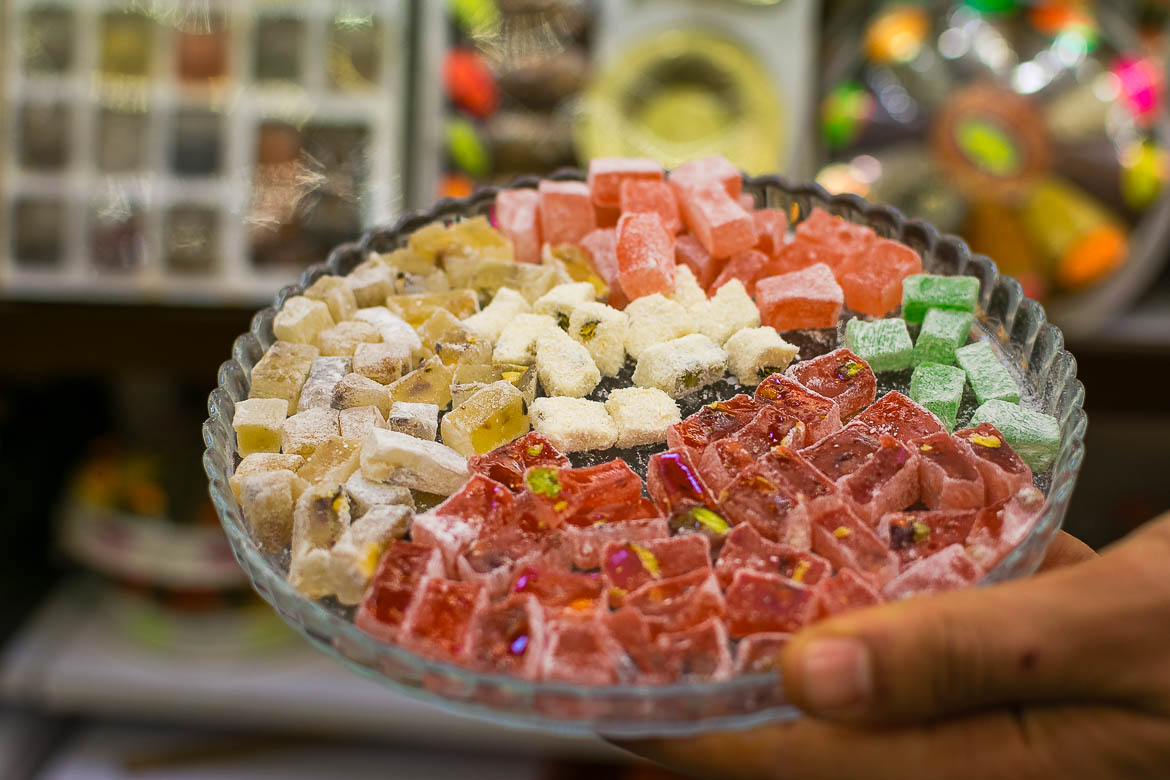 A plate full of different kinds of turkish delight.