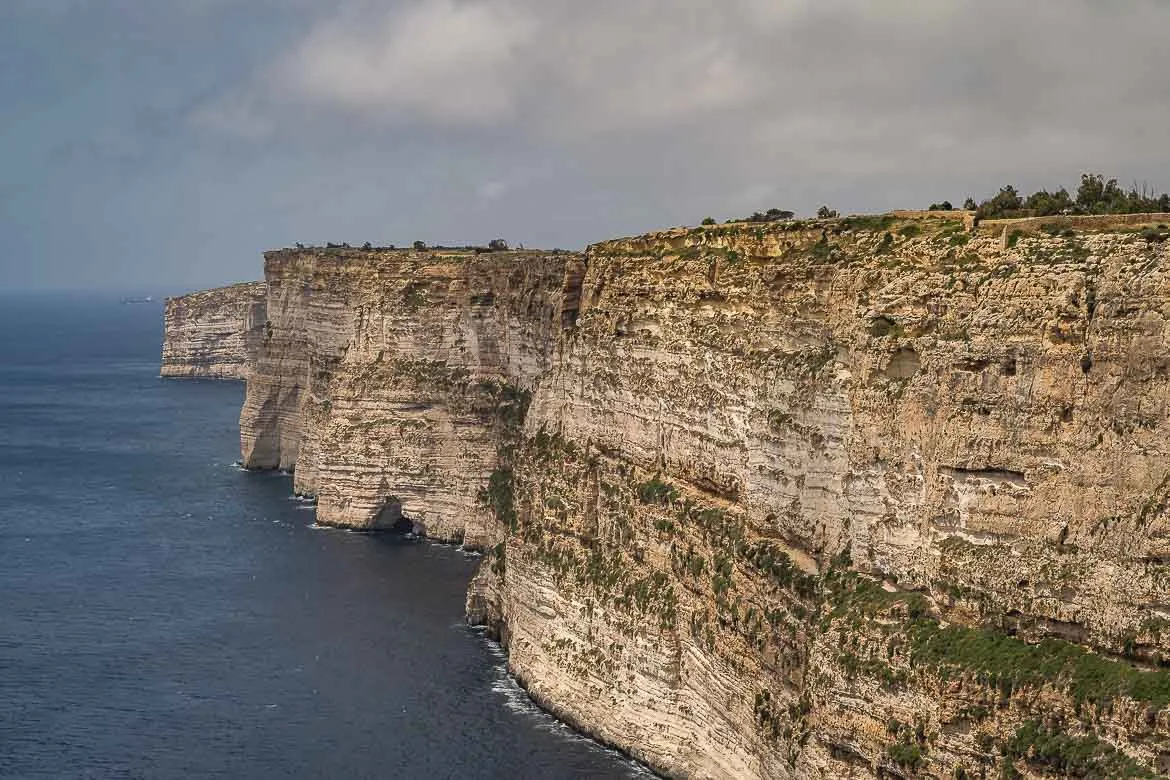 Panoramic view of Ta' Cenc Cliffs overlooking the Mediterranean Sea.