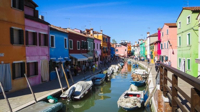 This photo shows the colourful houses in Burano, Veneto, Italy. Venice islands the perfect Venice day trip.