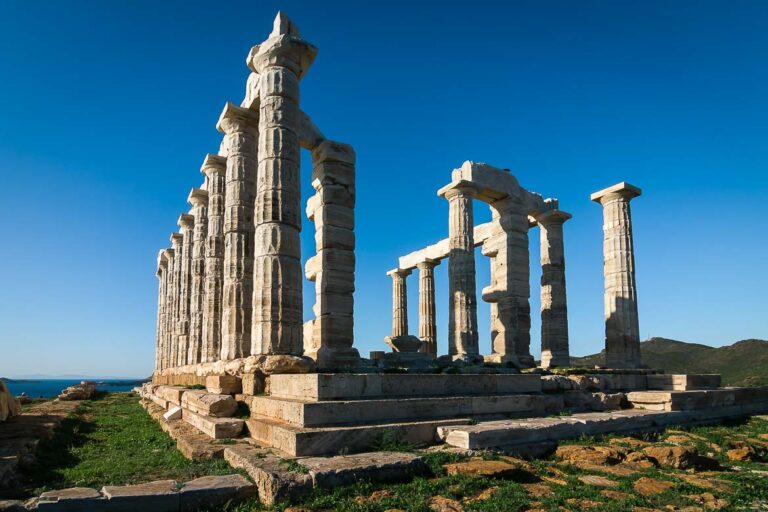 This image shows the temple of Poseidon, the most iconic things to see in Cape Sounion. This is why we chose this to be the featured image of our article Cape Sounion From Athens Day Trip.
