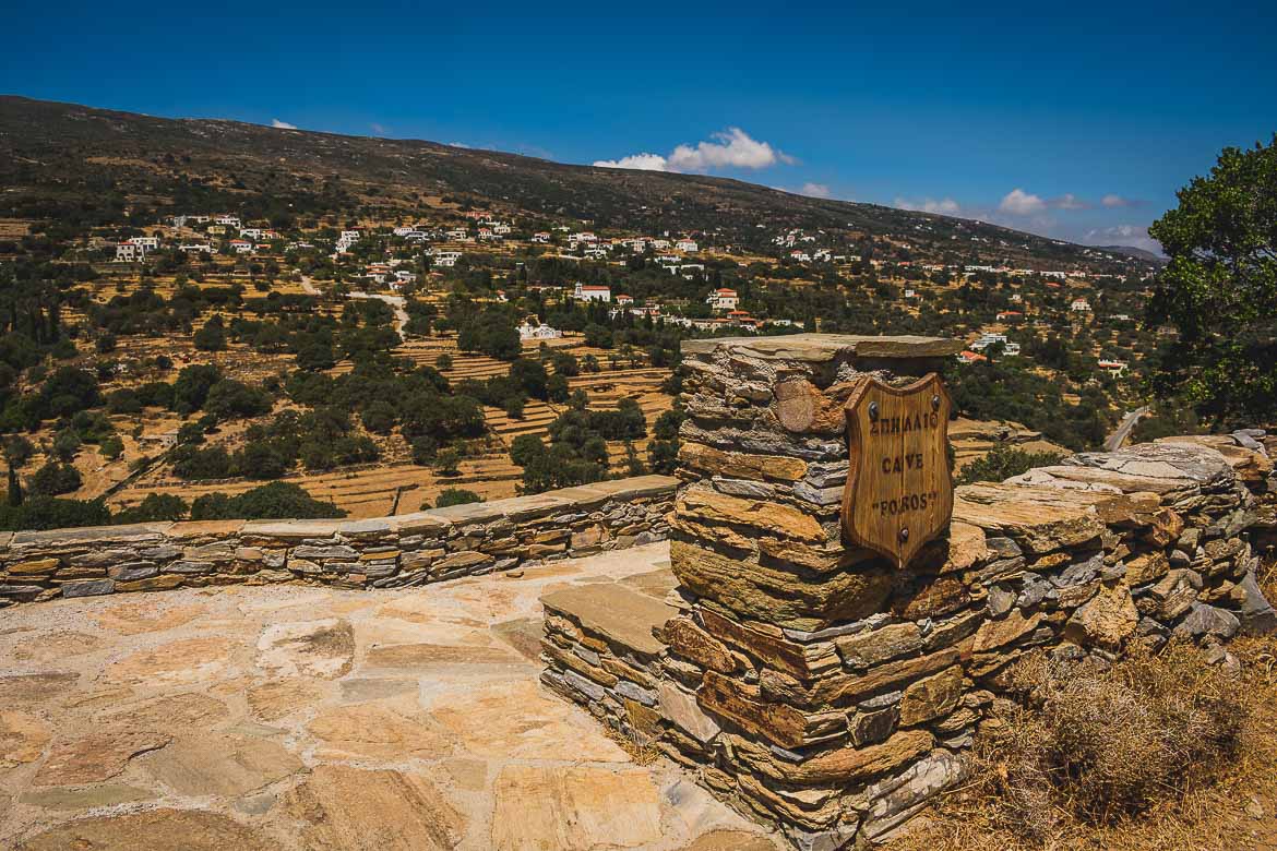 This photo shows the entrance to one of the lesser-known but very beautiful caves in Greece, Foros Cave on Andros Island, Cyclades.