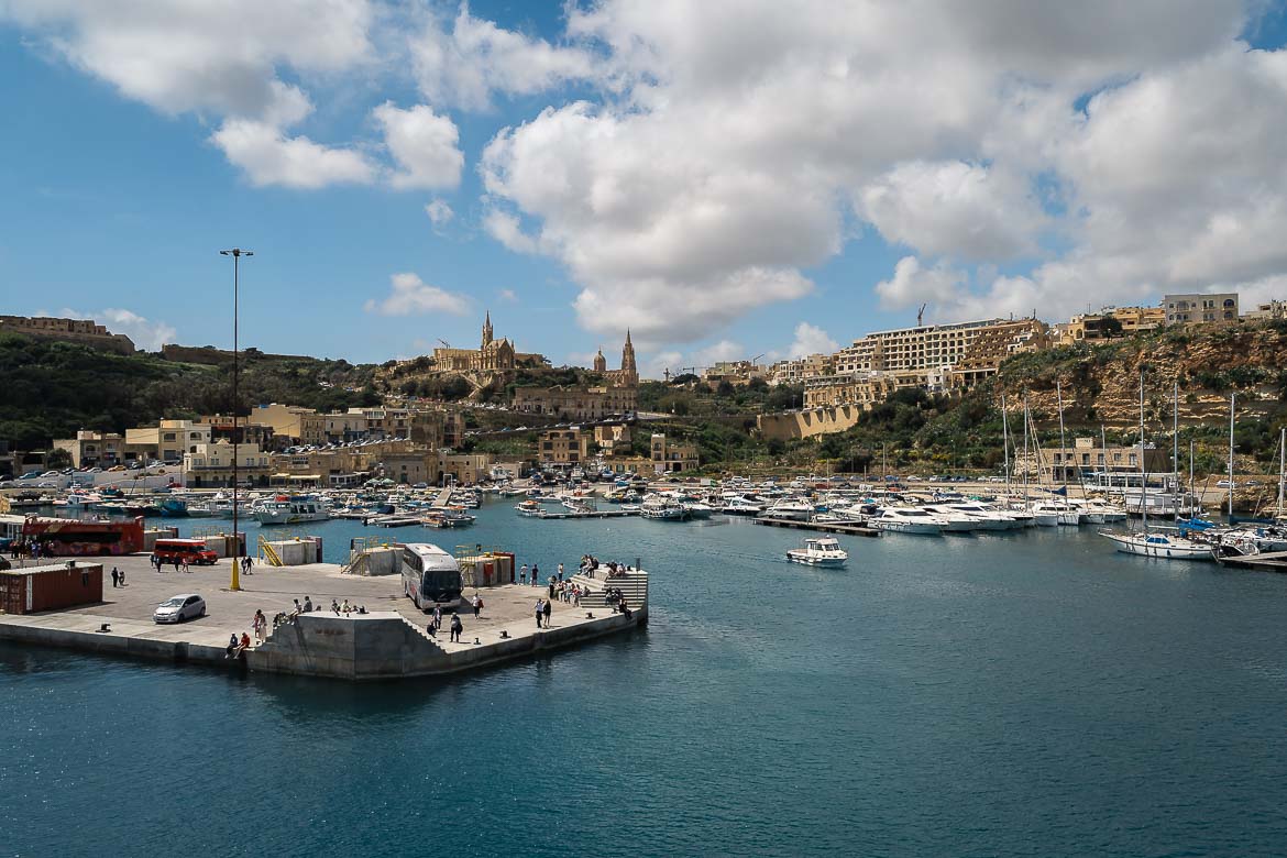 This image shows a panoramic view of Gozo's port, taken from the ferry.
