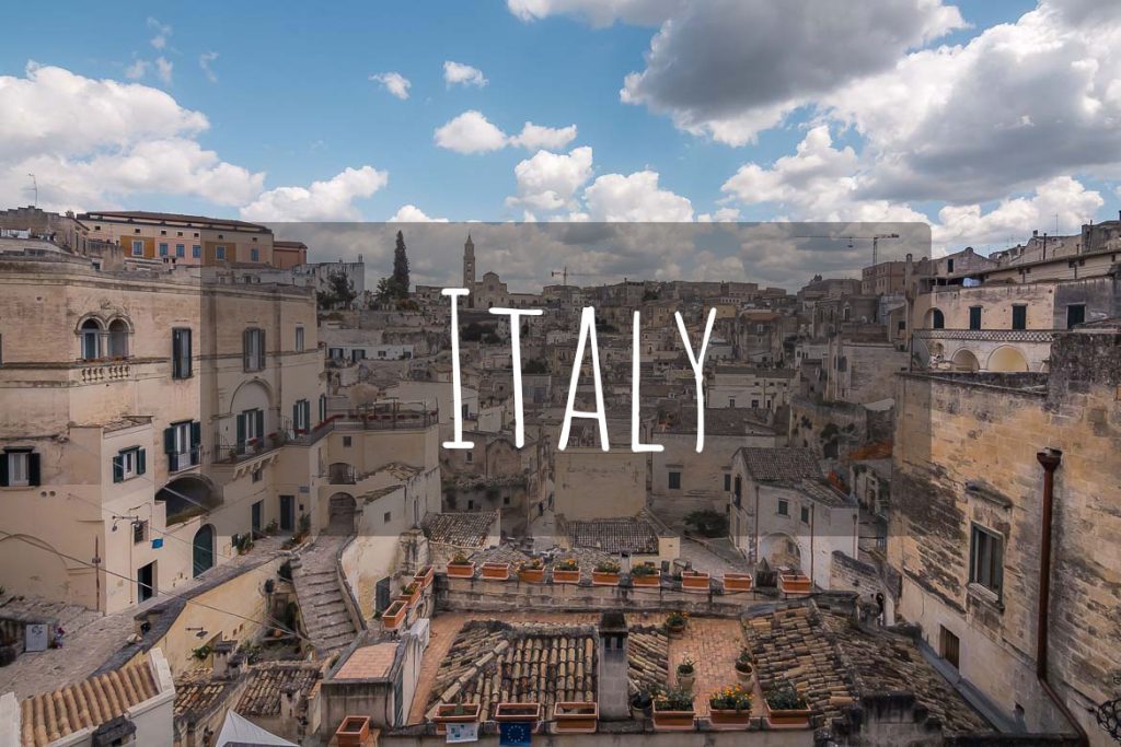 This image shows a panoramic view of Matera in Italy. It's the cover photo of Italy as a destination.