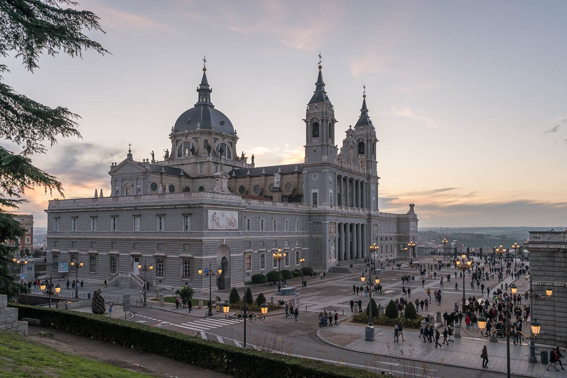 This image shows a panoramic view of the Almudena Cathedral.
