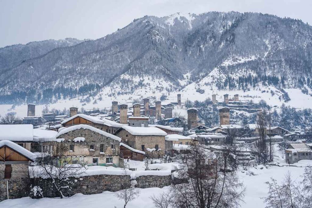 Mestia in Winter & a Taste of Georgia’s Svaneti Region Panoramic view of Mestia covered in snow.