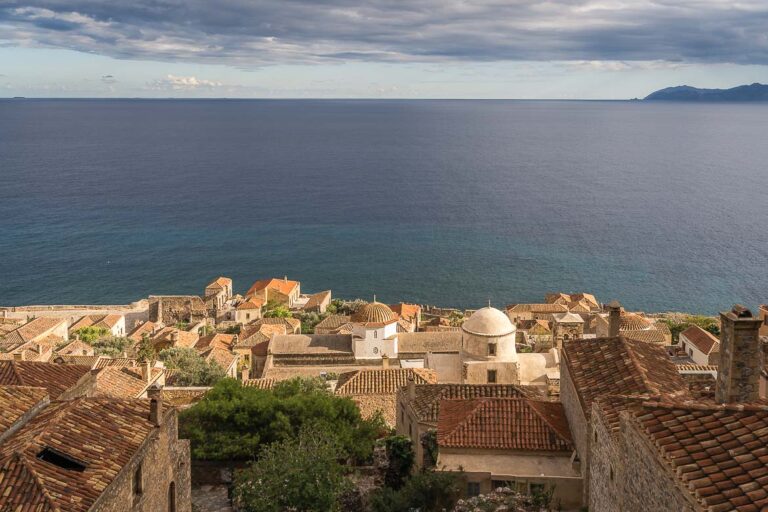 View of Monemvasia's Castle rooftops and the sea in the backdrop.