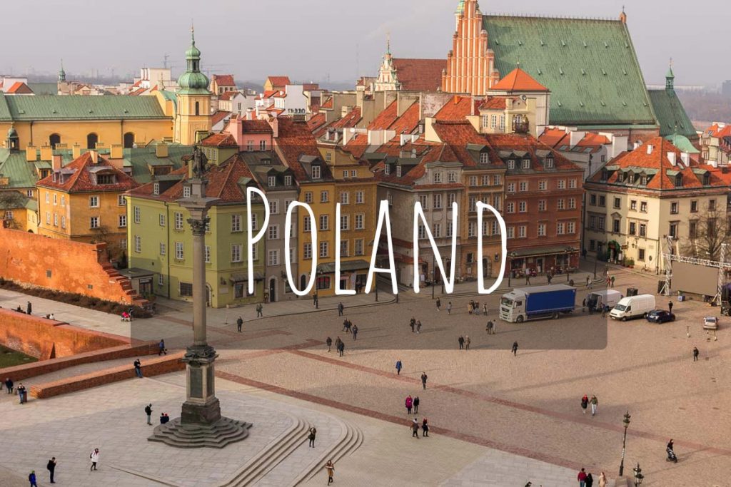 This image shows a panoramic view of Castle Square in Warsaw Old Town. It's the cover photo of Poland as a destination.