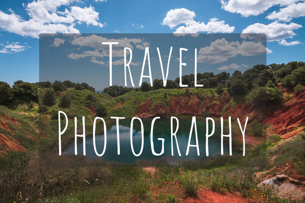 This image shows a green lake surrounded by red rocks. There's overlay text that reads Travel Photography.