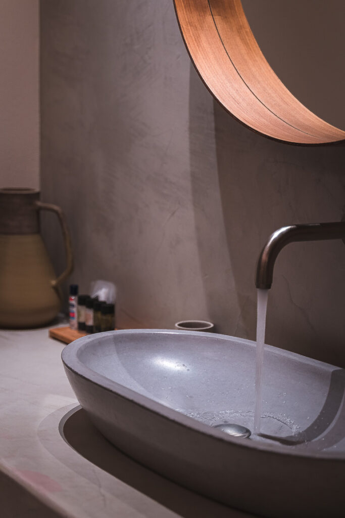 This image shows a room's bathroom at Verina Hotel in Sifnos.