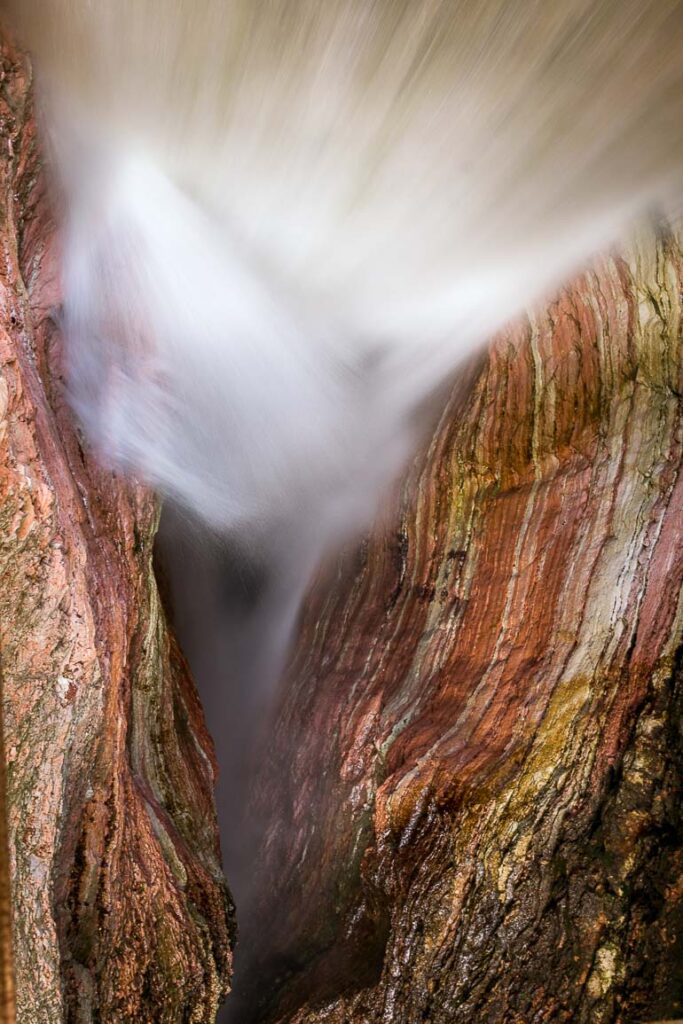 This image shows a waterfall in Trento.