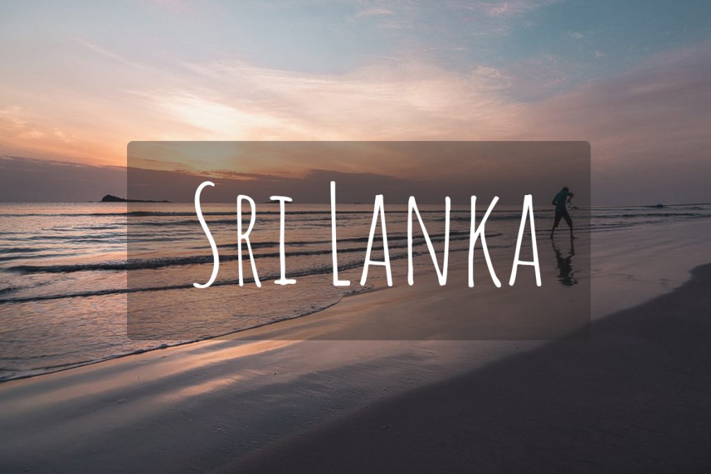 This image shows the beach in Trincomalee in Sri Lanka during sunrise. A fisherman is shown pulling the fishing net from the sea. It's the cover photo of Sri Lanka as a destination.