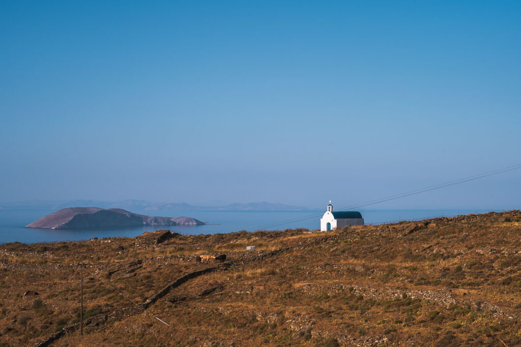 This photo shows a lonely church on a barren slope.