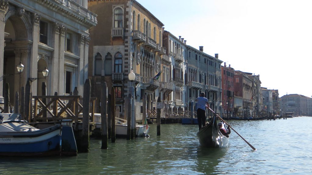 This is a picture of a gondola ride in the grand canal, venice, italy. One of the top things to do in venice.