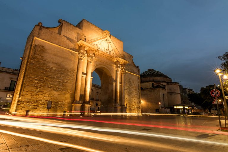 This is a long exposure shot of Porta Napoli in Lecce in the evening. We've chosen this photo to be the featured image of our article What to do in Lecce, Italy's Florence of the South.