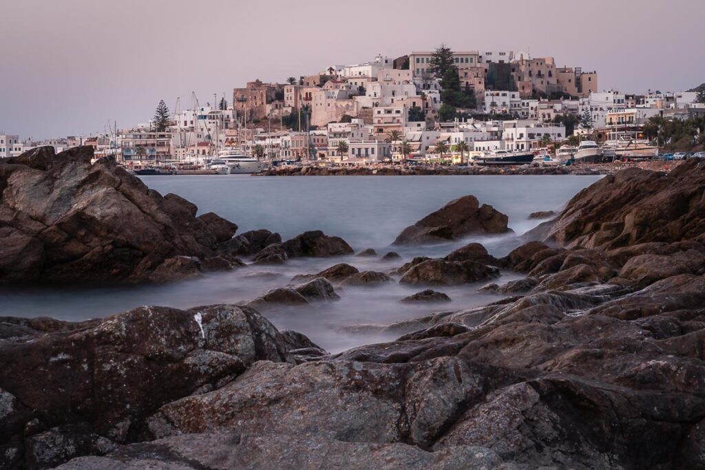 This image shows the view of Chora and the Castle and it's the feature image of our article: What To Do in Naxos – 35 Things To Do & Guide